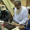 Donald Schoenholt with employees at Gillies Coffee Company, Brooklyn, NY